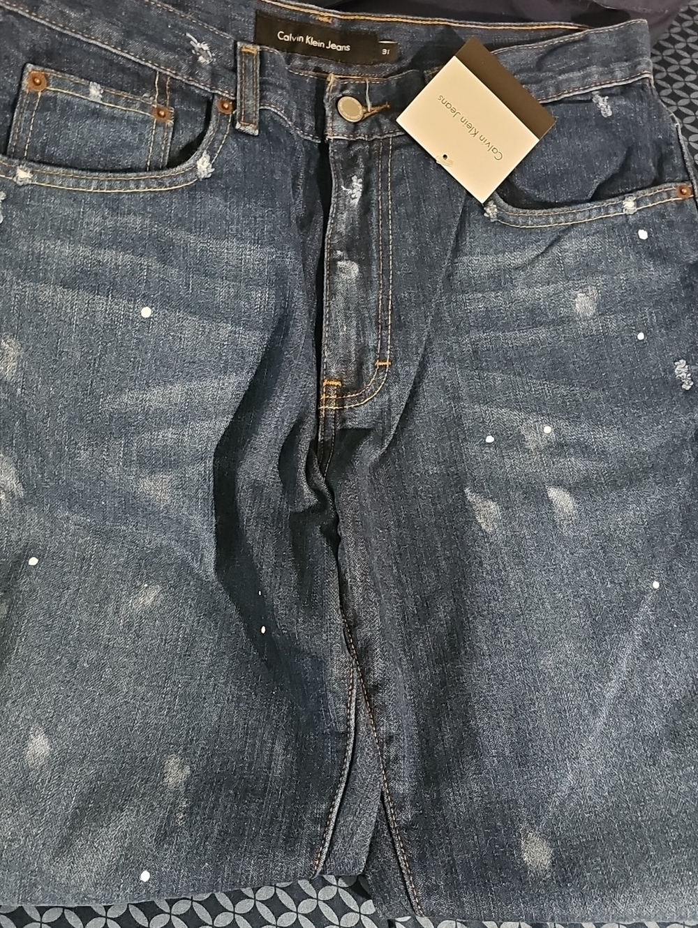 Calvin Klein Men’s Blue Distressed Paint-Splatter Jeans